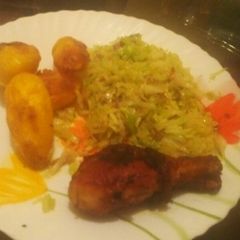 Fried potatoes + fried chicken drumsticks+steamed cabbages A picture of Fried potatoes + fried chicken drumsticks+steamed cabbages.
