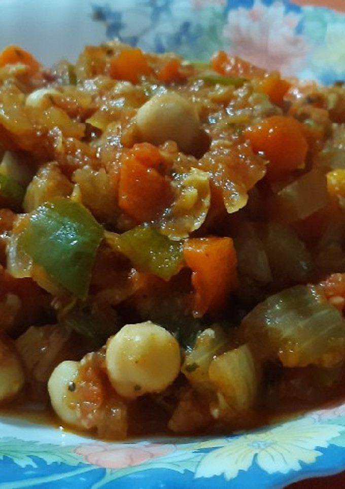 Una foto de Garbanzos guisados con taquitos de jamón