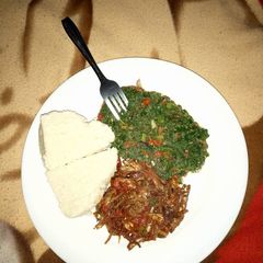 A picture of Stewed Omena served with kales and ugali.