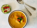 Chicken Thai yellow curry served with Ajard cucumber relish sauce