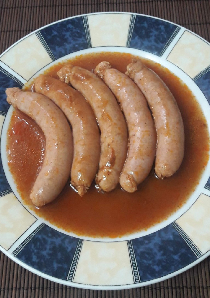 Una foto de Salchichas con Coca Cola