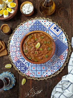 صورة لوصفة فول بالطماطم و الثوم