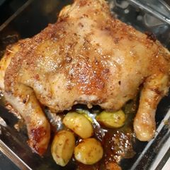 A picture of Chicken baked with herbs seasonings.