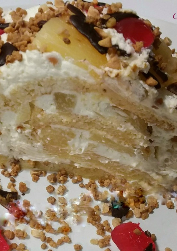 Una foto de Arrollado/brazo gitano, con piña y nata
