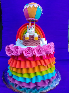Una foto de Pastel arcoíris 🌈