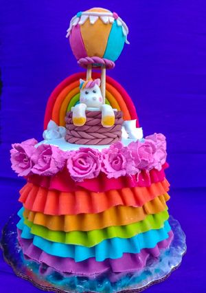 Una foto de Pastel arcoíris 🌈