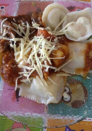 Una foto de Sonrrentinos con tapa de empanadas