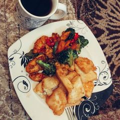 A picture of Golden yam and chicken stir fry.