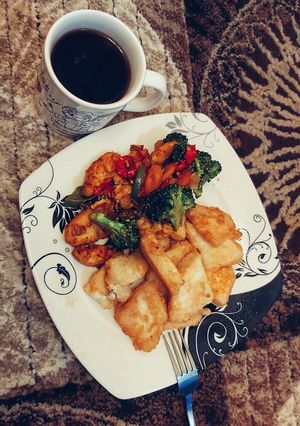 A picture of Golden yam and chicken stir fry.