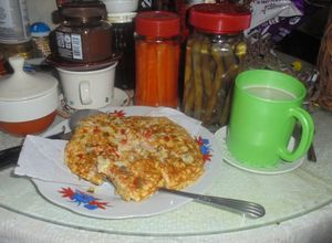 Una foto de TORTIPAISA(tortilla paisa)