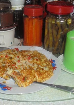 Una foto de TORTIPAISA(tortilla paisa)