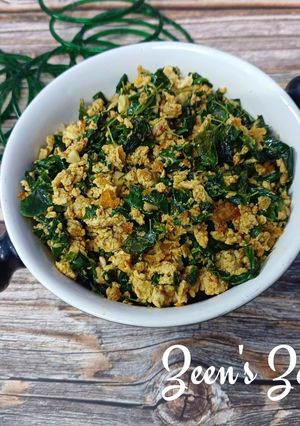 A picture of Anda Bhurji with Fresh Drumstick Leaves.