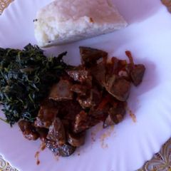 A picture of Fried Liver and managu with Ugali.
