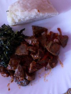A picture of Fried Liver and managu with Ugali.