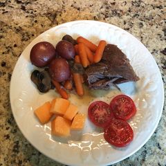 A picture of Chuck Pot Roast with Baby Carrots & Baby Red Potatoes.