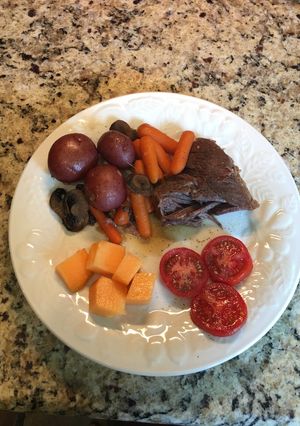 A picture of Chuck Pot Roast with Baby Carrots & Baby Red Potatoes.