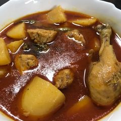 A picture of Aloo chicken salan.