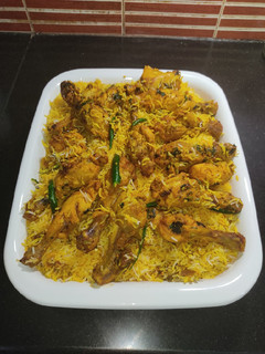 A picture of Chicken Drumsticks Tikka Biryani.