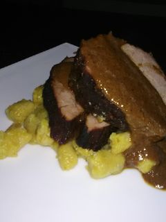 Una foto de Asado Negro con ñoquis de Plátano