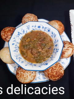 A picture of Semovita Masa with taushe(vegetable soup).