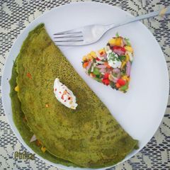 Multi grain stuffed spinach chilla A picture of Multi grain stuffed spinach chilla.