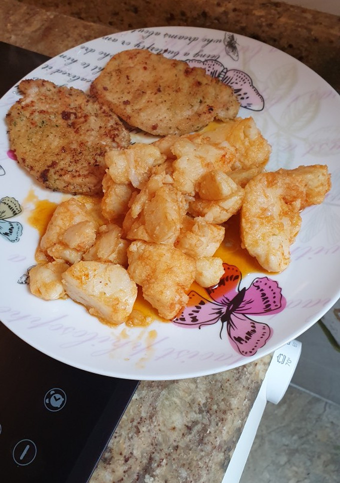 Una foto de Coliflor con pimentón y cinta de lomo empanada