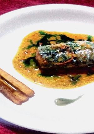 A picture of Steamed Fish in Carrot Jus.
