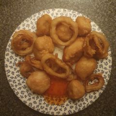 A picture of Triple cooked deep fried battered Onion an Chicken.