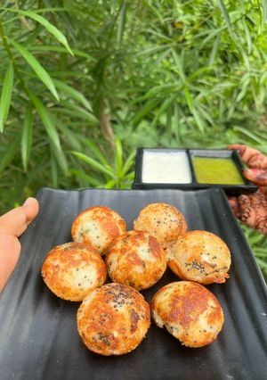 सूजी का गुलियप्पा रेसिपी मुख्य फोटो