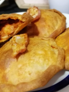 Una foto de Empanadillas de pulpo encebollado