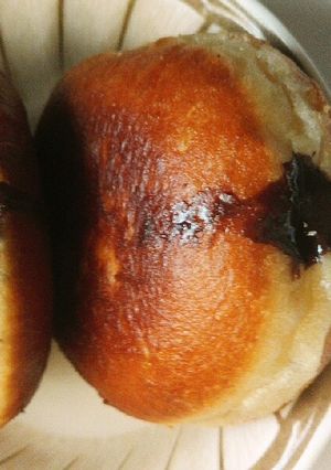 A picture of Chocolate filled doughnuts.