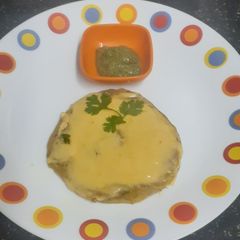 A picture of Mix Vegetable Paratha with Cheese Slice Spread.