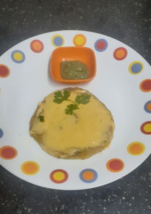 A picture of Mix Vegetable Paratha with Cheese Slice Spread.