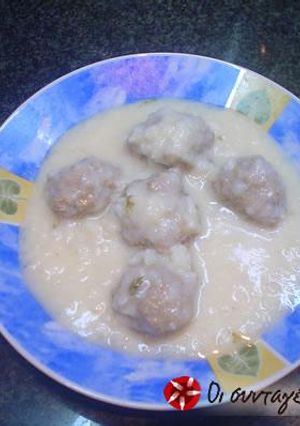 A picture of Giouvarlakia with egg and lemon sauce.