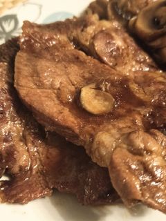 Una foto de Chuletas de cerdo en miel y Coca-cola