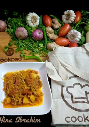 A picture of Cabbage Carrots peas & potato vegetable.