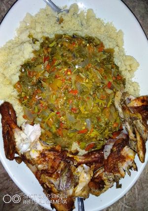 A picture of Couscous, vegetable soup and roasted chicken.