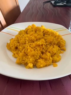 Una foto de Arroz meloso con pollo