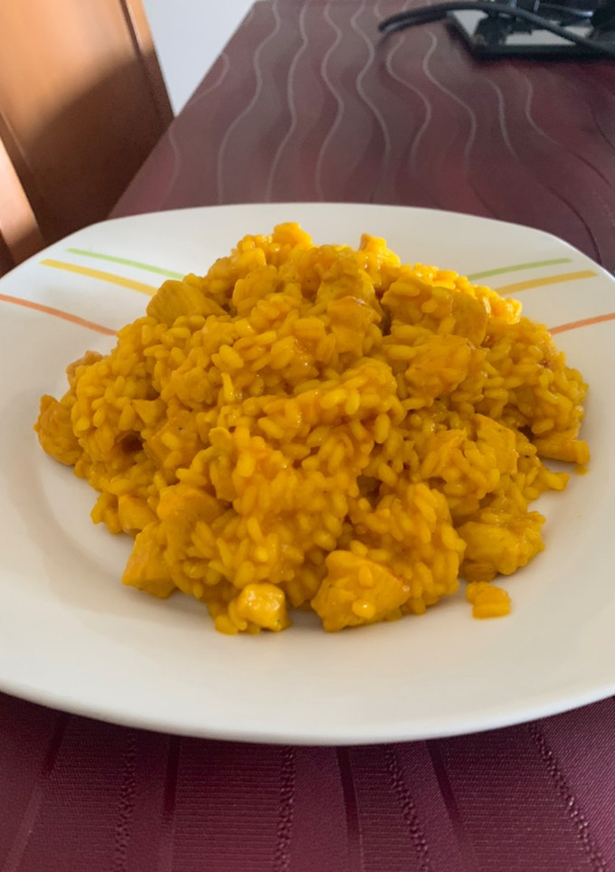 Una foto de Arroz meloso con pollo