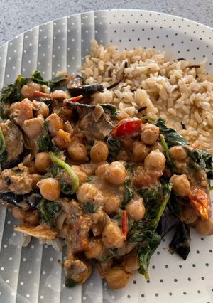 A picture of Aubergine, spinach and chickpea curry.