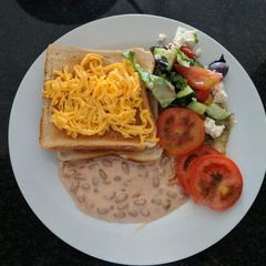 A picture of My quick baked beans salad for breakfast.