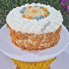 A picture of Vanilla Cake with whipped Cream Frosting.