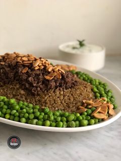 صورة لوصفة فريكة مع اللحم المفروم والبازلاء