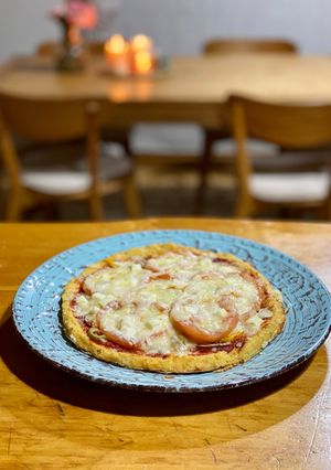Una foto de Pizza con masa de coliflor