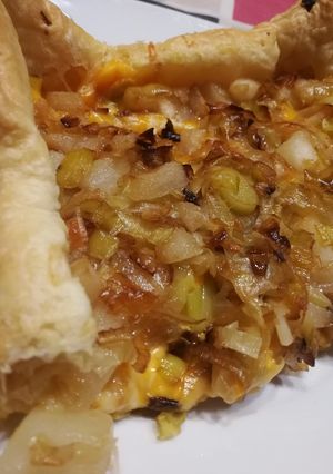 Una foto de Tartaletta de puerro y pera