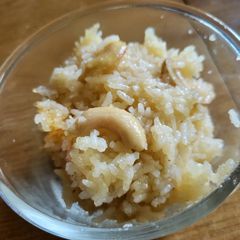 A picture of Jaggery rice with cashew nuts.
