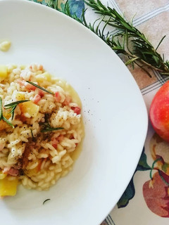 A picture of Risotto with Fuji Apples, Crispy Bacon, and Rosemary.