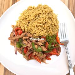 A picture of Saffron Rice and Chicken Sauce.
