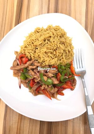 A picture of Saffron Rice and Chicken Sauce.