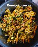 Veggies loaded wheat pasta In spinach tomato gravy